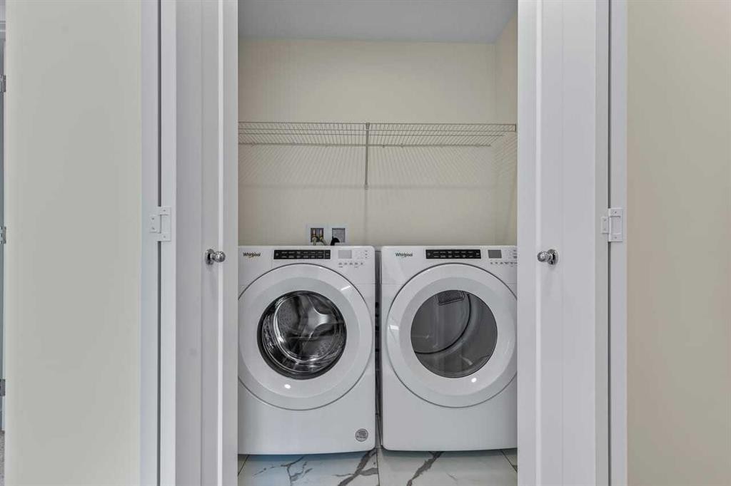 42 Corner Glen Manor Ne, Calgary, AB - Indoor Photo Showing Laundry Room