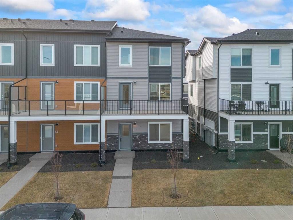 42 Corner Glen Manor Ne, Calgary, AB - Outdoor With Balcony With Facade