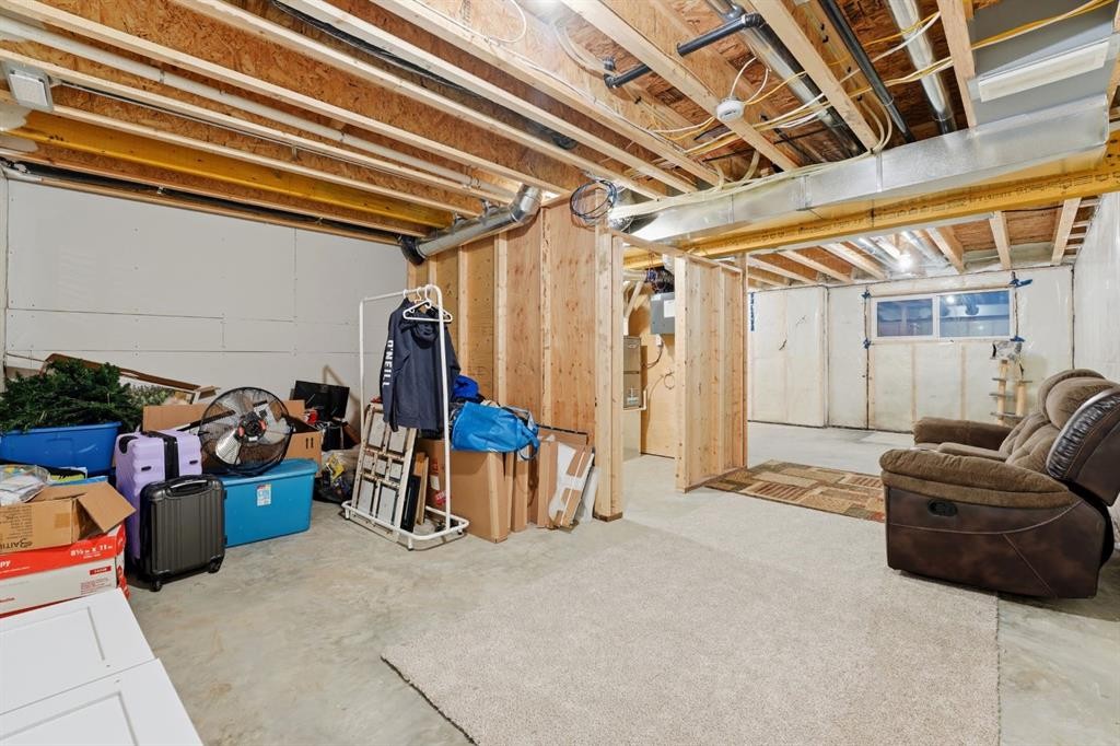 32 Station Drive, Sylvan Lake, AB - Indoor Photo Showing Basement