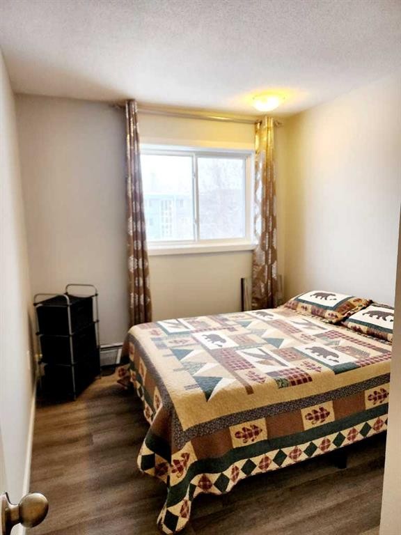 306-4811 55 Street, Red Deer, AB - Indoor Photo Showing Bedroom