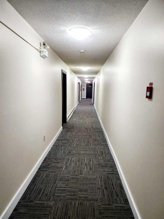 306-4811 55 Street, Red Deer, AB - Indoor Photo Showing Other Room