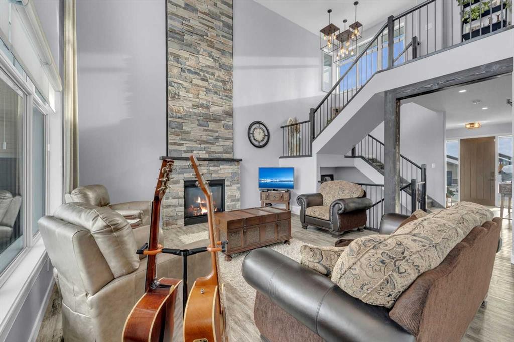 5 Leonard Close, Sylvan Lake, AB - Indoor With Fireplace