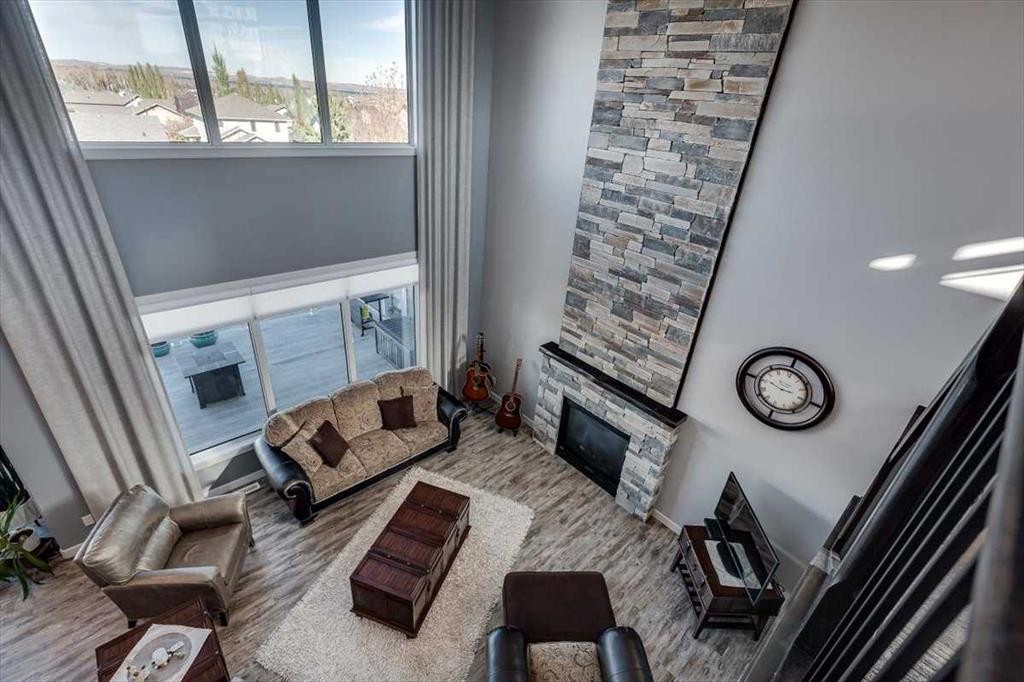 5 Leonard Close, Sylvan Lake, AB - Indoor With Fireplace