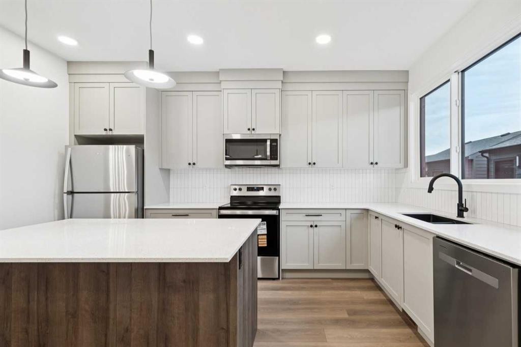 28 Bluerock Terrace Sw, Calgary, AB - Indoor Photo Showing Kitchen With Upgraded Kitchen