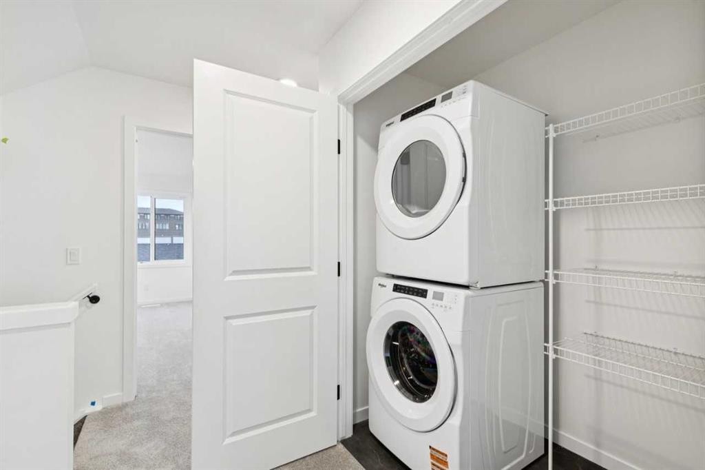 28 Bluerock Terrace Sw, Calgary, AB - Indoor Photo Showing Laundry Room