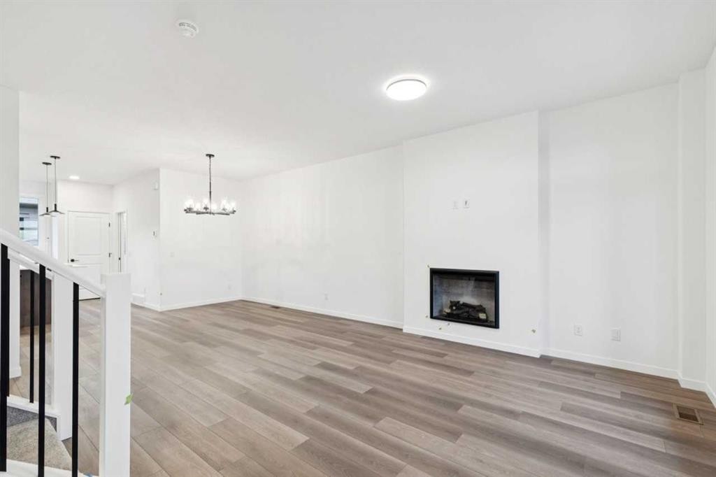 28 Bluerock Terrace Sw, Calgary, AB - Indoor With Fireplace