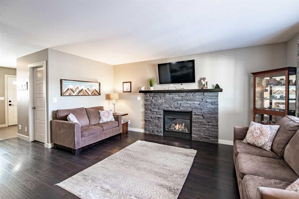 60 Vincent Close, Red Deer, AB - Indoor Photo Showing Living Room With Fireplace