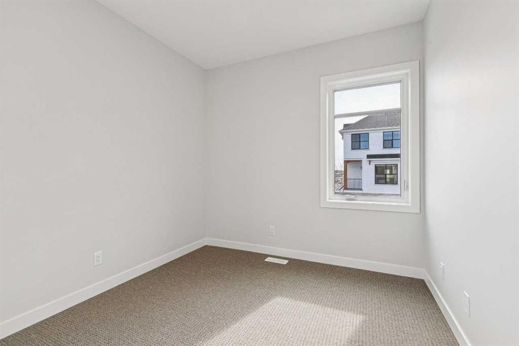 9 Treeline Avenue Sw, Calgary, AB - Indoor Photo Showing Other Room
