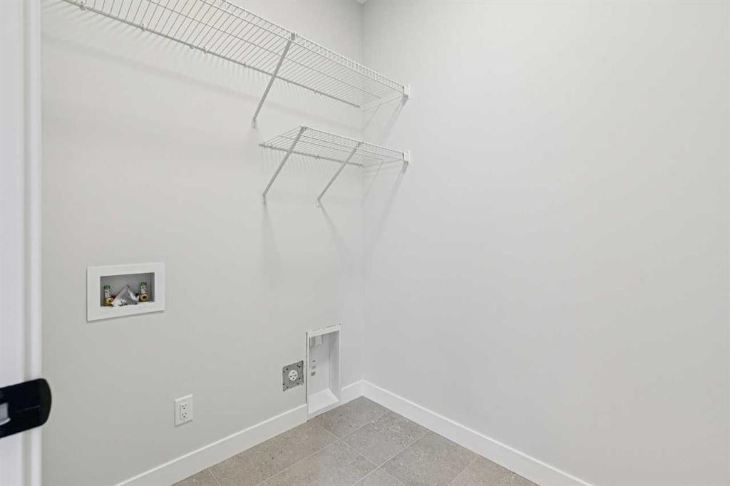 9 Treeline Avenue Sw, Calgary, AB - Indoor With Storage