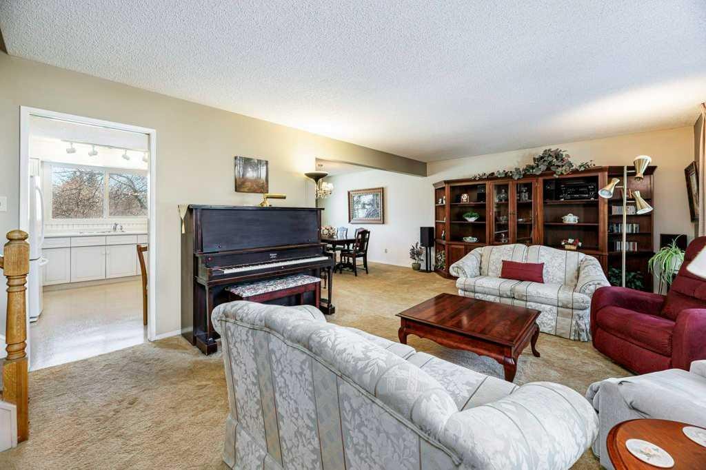 15 Waghorn Close, Red Deer, AB - Indoor Photo Showing Living Room With Fireplace