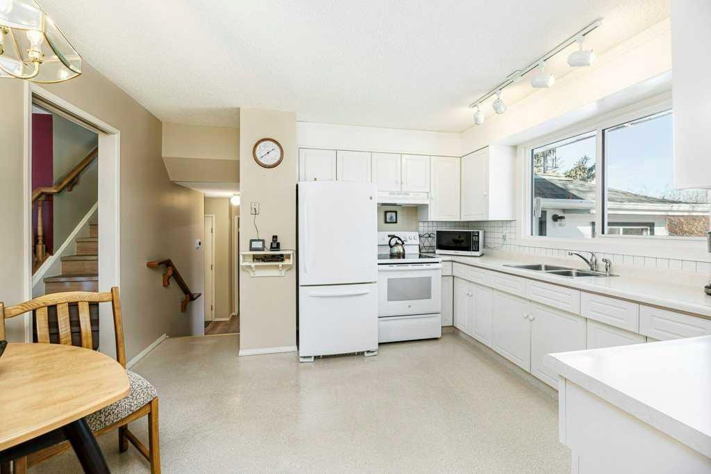 15 Waghorn Close, Red Deer, AB - Indoor Photo Showing Kitchen With Double Sink