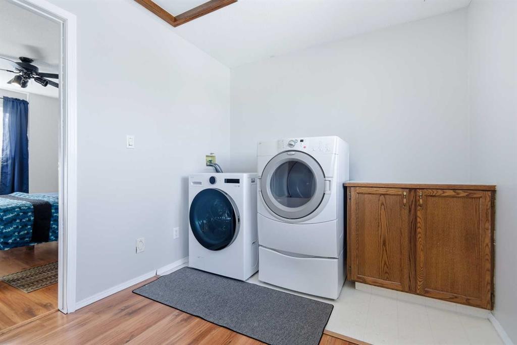 39081 C&E Trail, Red Deer, AB - Indoor Photo Showing Laundry Room
