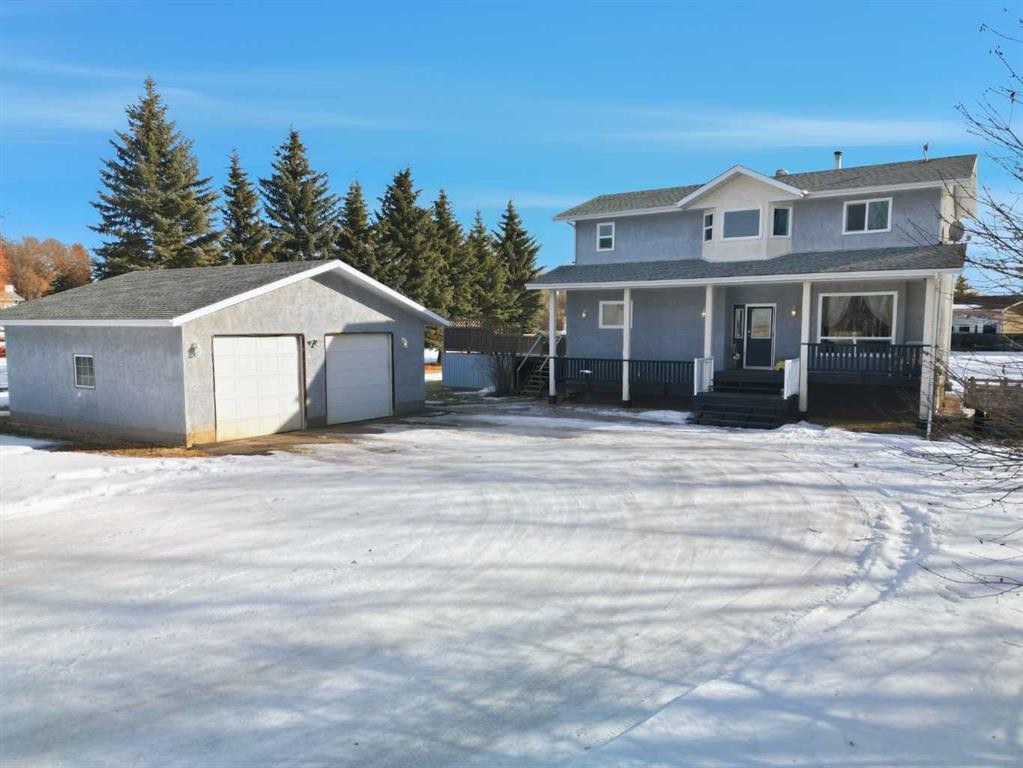 39081 C&E Trail, Red Deer, AB - Outdoor With Deck Patio Veranda With Facade