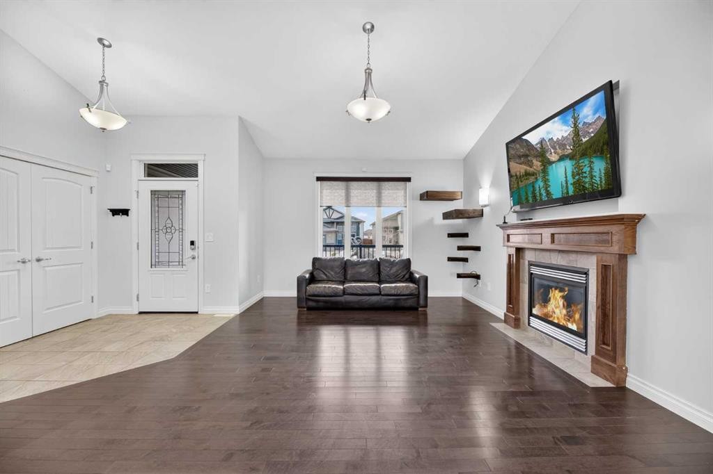 17 Viceroy Crescent, Olds, AB - Indoor Photo Showing Living Room With Fireplace