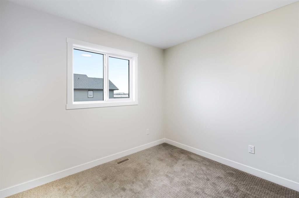 14 Vista Close, Blackfalds, AB - Indoor Photo Showing Other Room