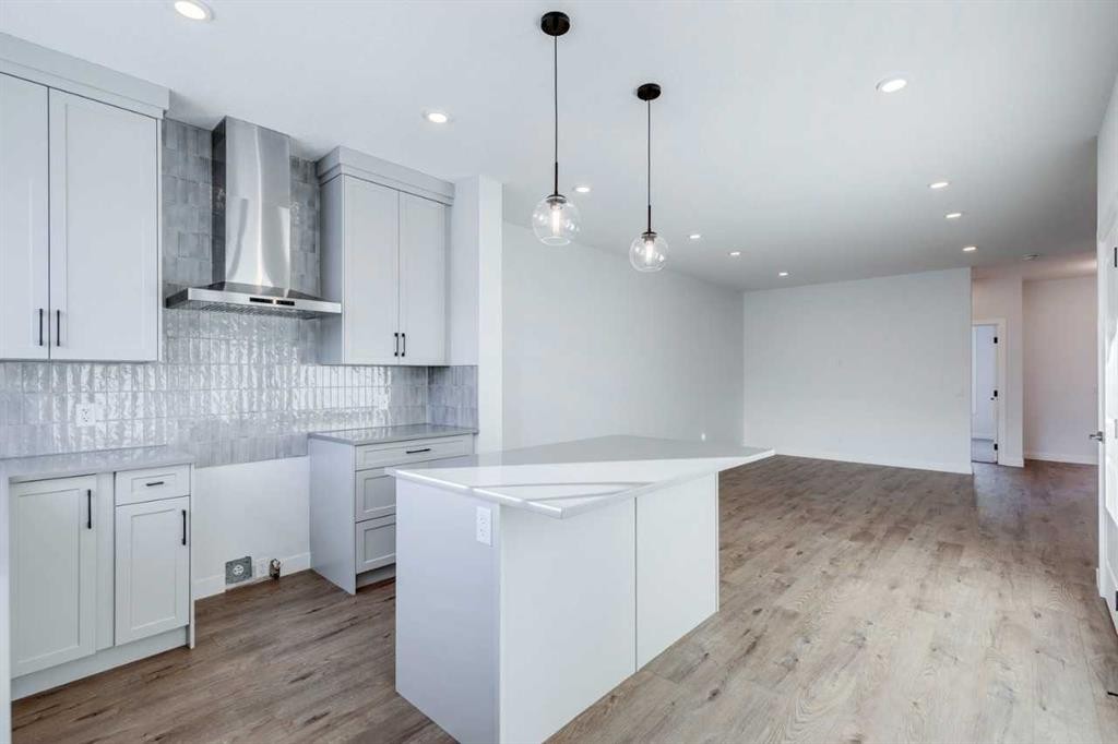 77 Savanna Place Ne, Calgary, AB - Indoor Photo Showing Kitchen With Upgraded Kitchen