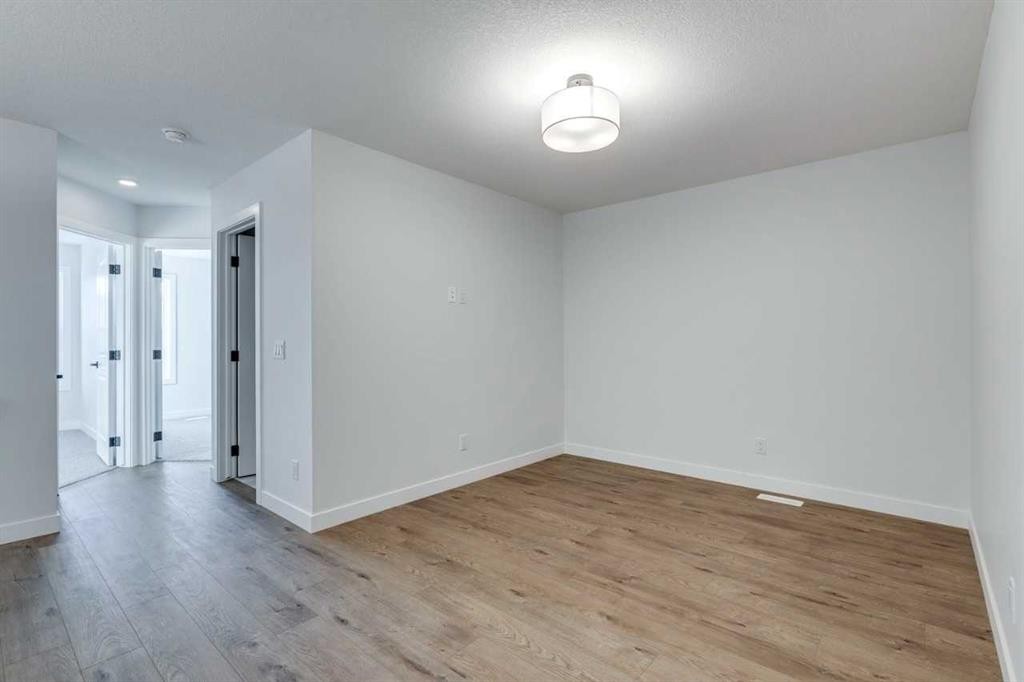 77 Savanna Place Ne, Calgary, AB - Indoor Photo Showing Other Room