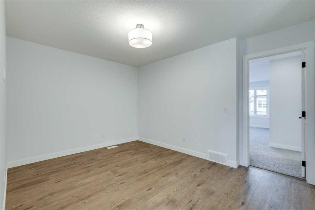 77 Savanna Place Ne, Calgary, AB - Indoor Photo Showing Other Room