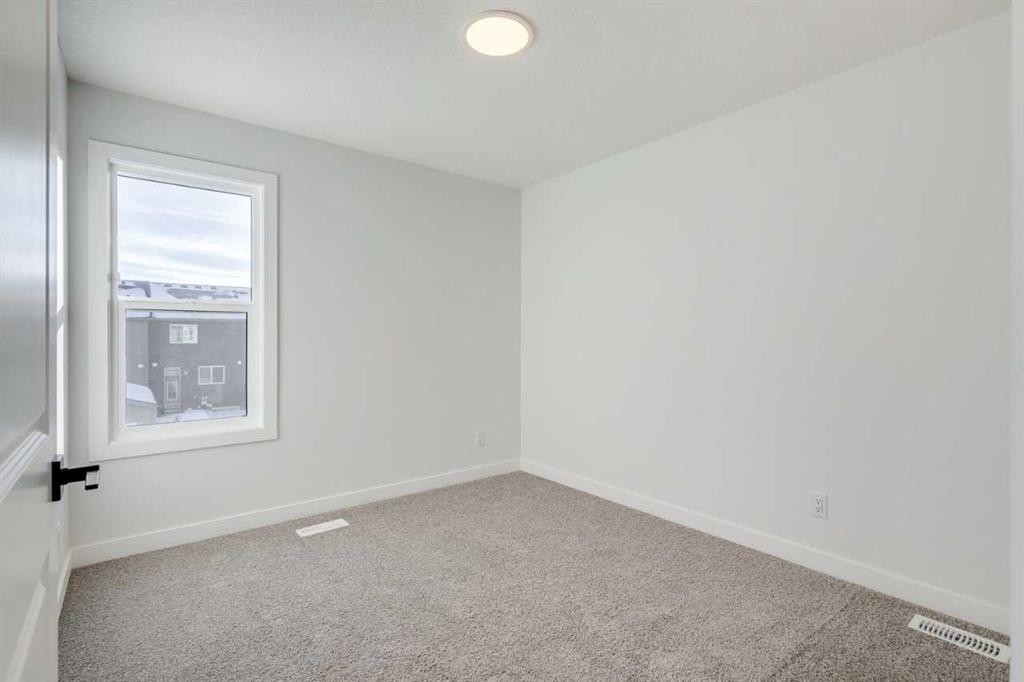 77 Savanna Place Ne, Calgary, AB - Indoor Photo Showing Other Room