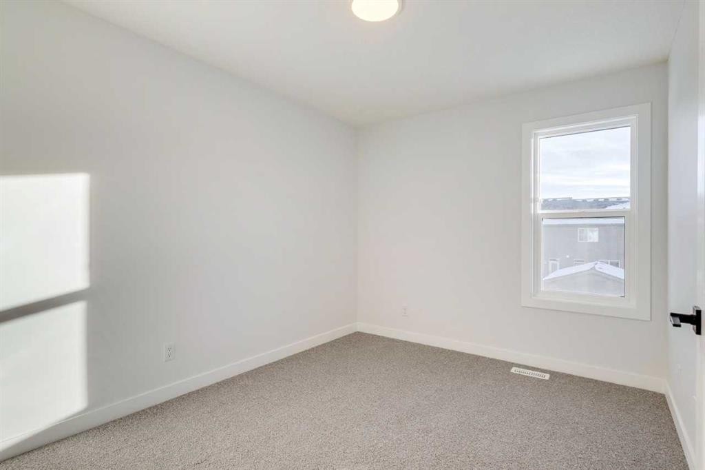 77 Savanna Place Ne, Calgary, AB - Indoor Photo Showing Other Room