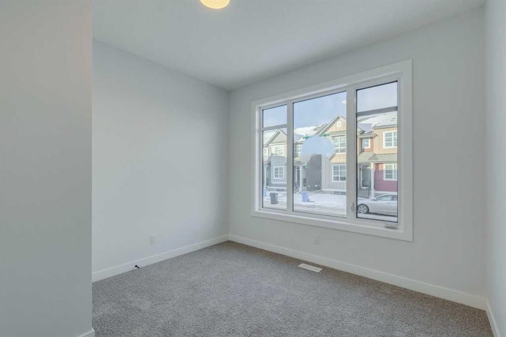 77 Savanna Place Ne, Calgary, AB - Indoor Photo Showing Other Room