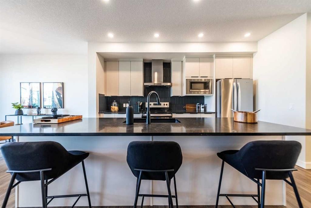 405 Sora Way Se, Calgary, AB - Indoor Photo Showing Kitchen With Stainless Steel Kitchen With Upgraded Kitchen