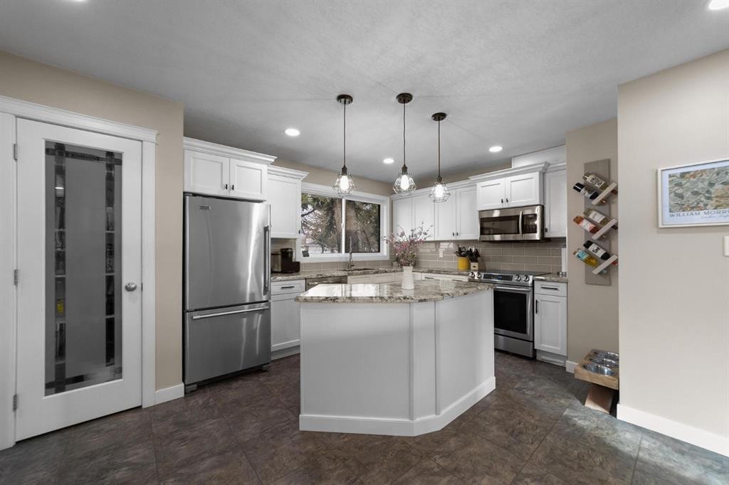 3630 Erickson Drive, Camrose, AB - Indoor Photo Showing Kitchen With Stainless Steel Kitchen With Upgraded Kitchen