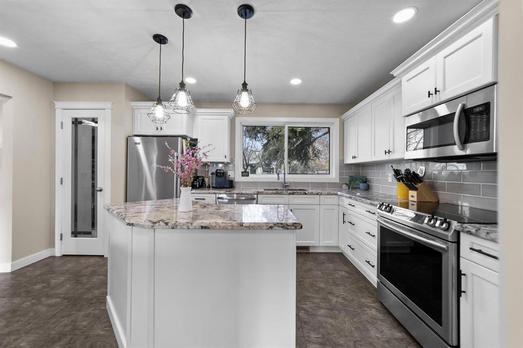 3630 Erickson Drive, Camrose, AB - Indoor Photo Showing Kitchen With Upgraded Kitchen