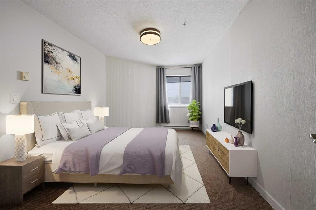 210-60 Jacobs Close, Red Deer, AB - Indoor Photo Showing Bedroom