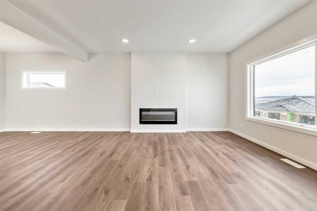 24 Heritage Link, Cochrane, AB - Indoor With Fireplace