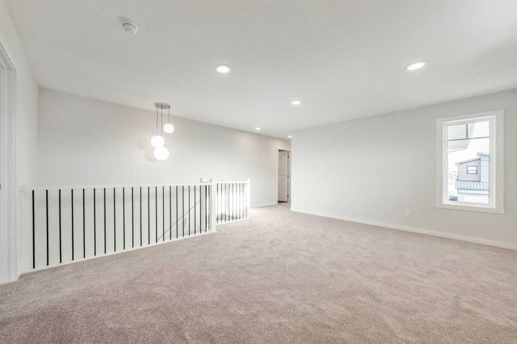24 Heritage Link, Cochrane, AB - Indoor Photo Showing Other Room