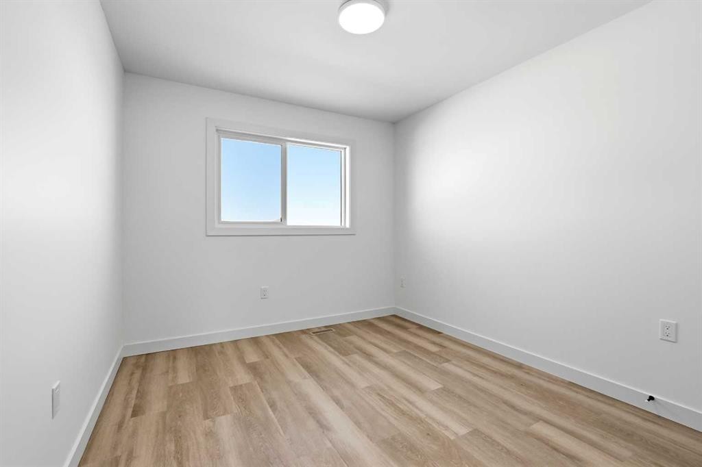 41 Violet Point, Sylvan Lake, AB - Indoor Photo Showing Other Room