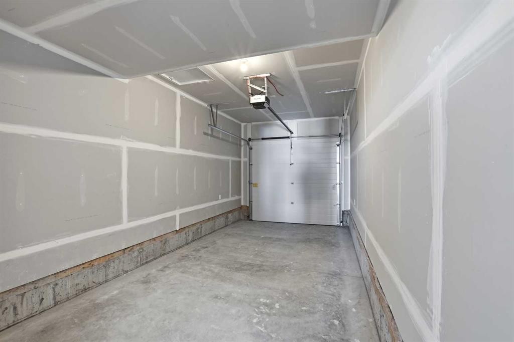 41 Violet Point, Sylvan Lake, AB - Indoor Photo Showing Garage