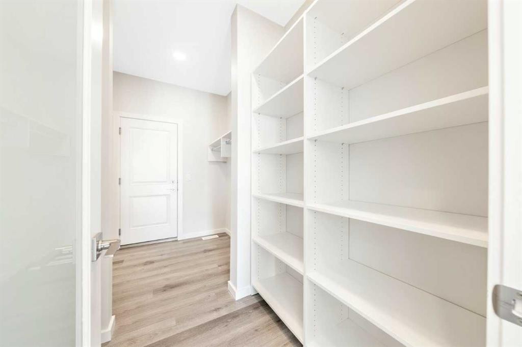 358 Heritage Boulevard, Cochrane, AB - Indoor With Storage