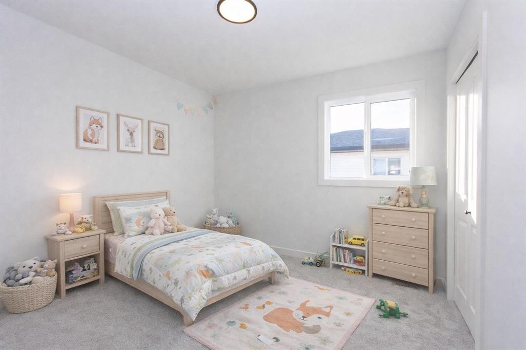 17 Trinity Street, Lacombe, AB - Indoor Photo Showing Bedroom