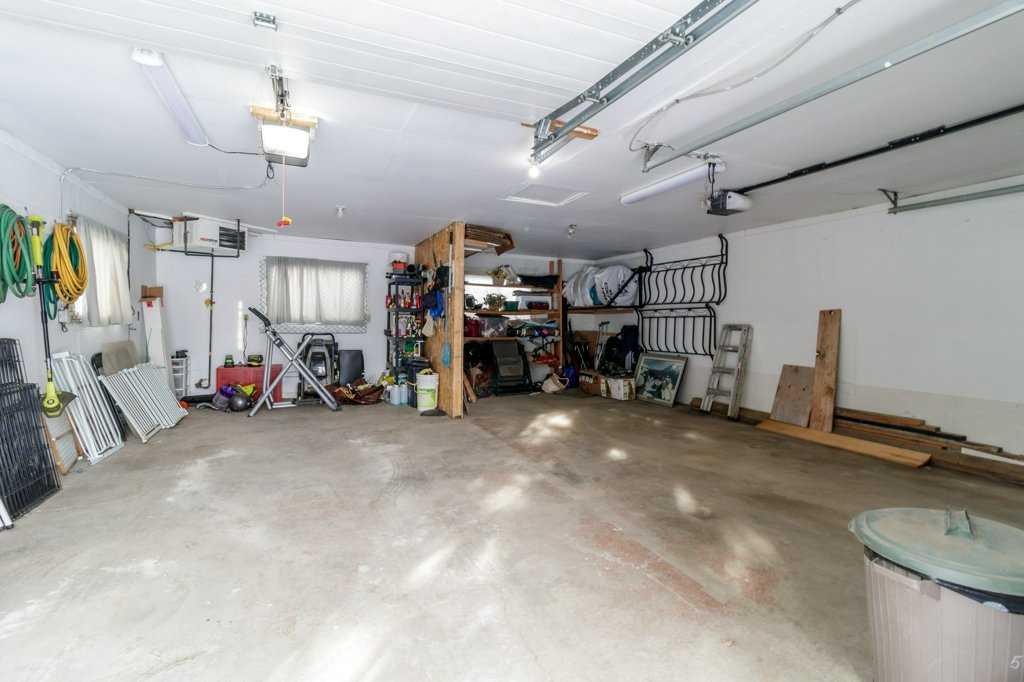 51 Phelan Close, Red Deer, AB - Indoor Photo Showing Garage