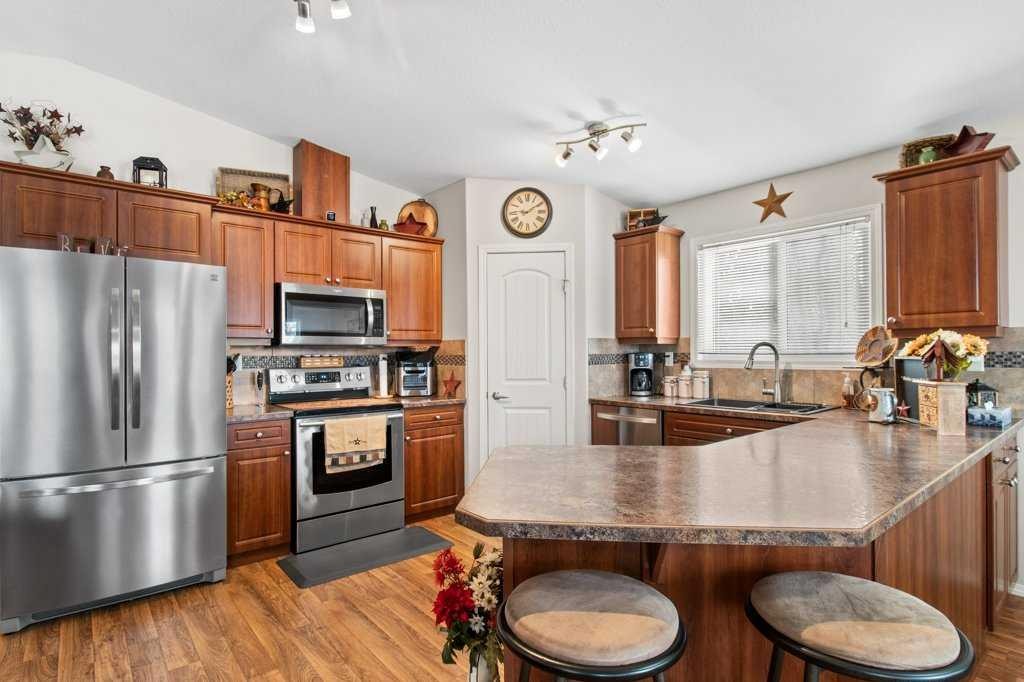 51 Phelan Close, Red Deer, AB - Indoor Photo Showing Kitchen With Stainless Steel Kitchen