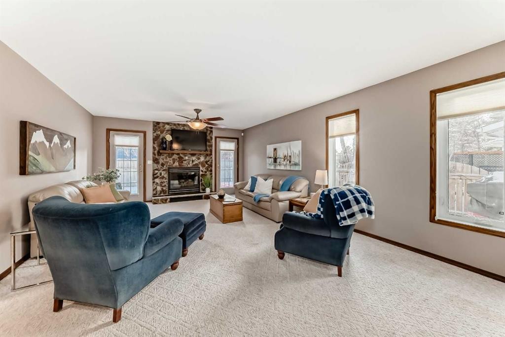128 Dickenson Crescent, Red Deer, AB - Indoor Photo Showing Living Room With Fireplace