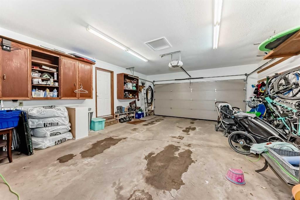 128 Dickenson Crescent, Red Deer, AB - Indoor Photo Showing Garage