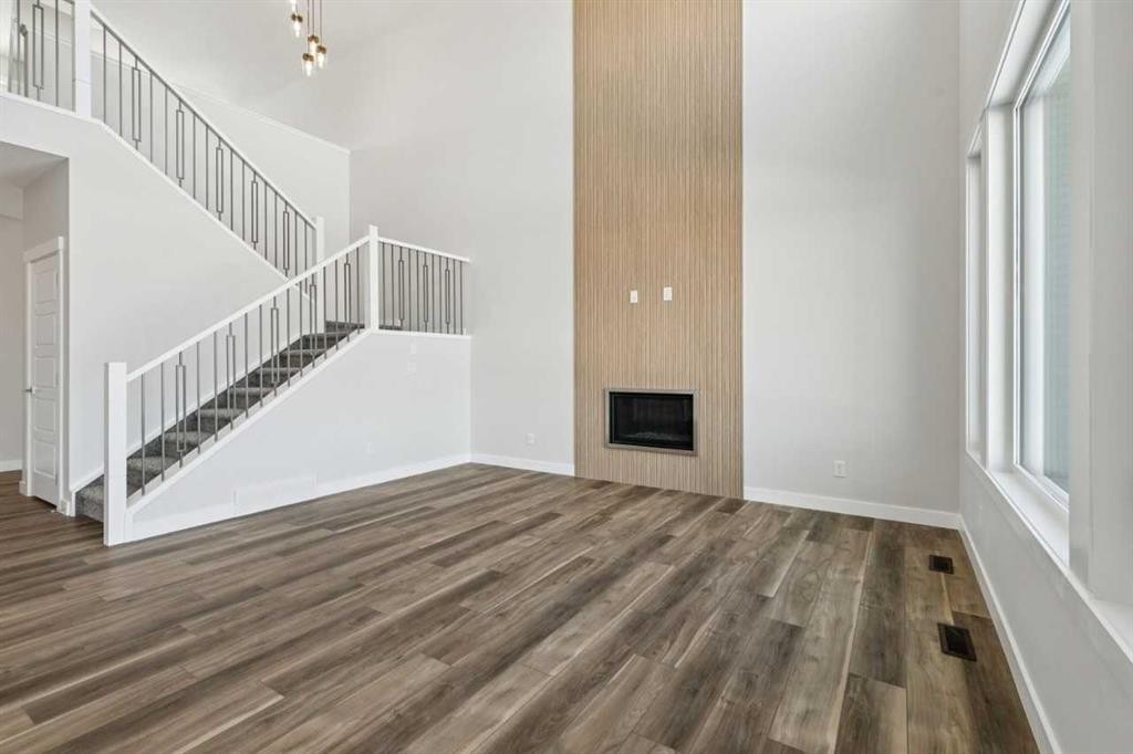420 Bridgeport Glen, Chestermere, AB - Indoor Photo Showing Other Room With Fireplace