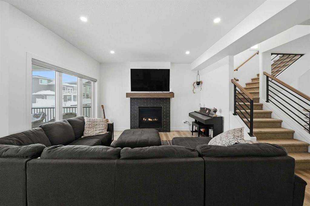 244 Emerald Drive, Red Deer, AB - Indoor Photo Showing Living Room With Fireplace