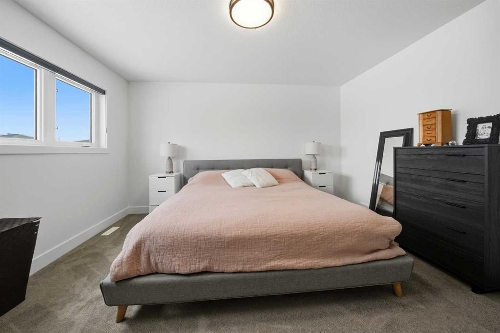 244 Emerald Drive, Red Deer, AB - Indoor Photo Showing Bedroom