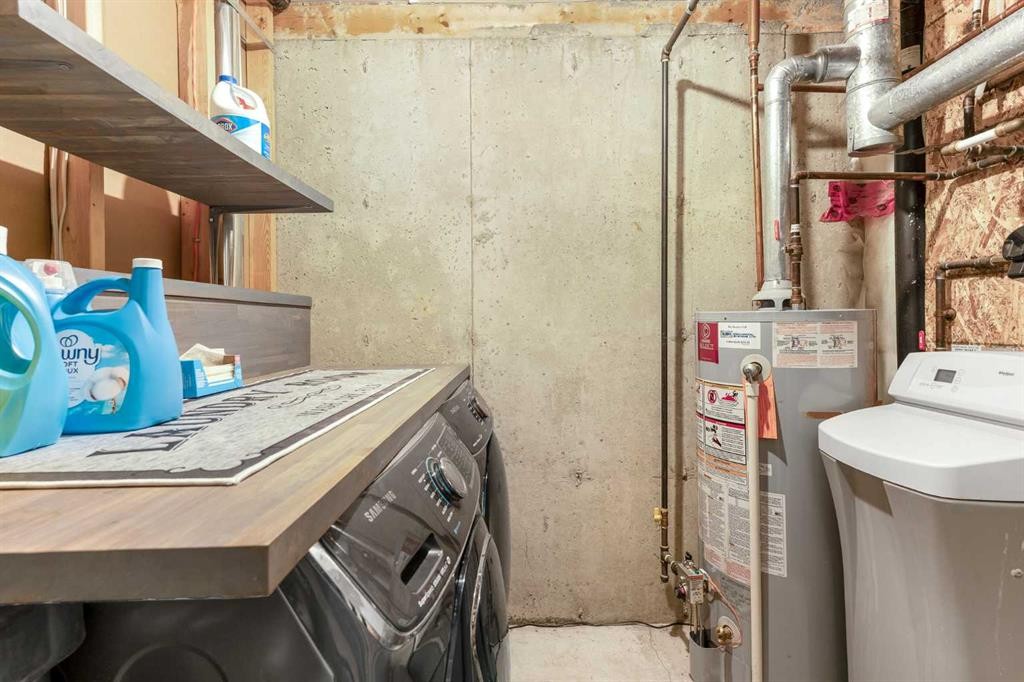 32 Legend Court, Sylvan Lake, AB - Indoor Photo Showing Laundry Room