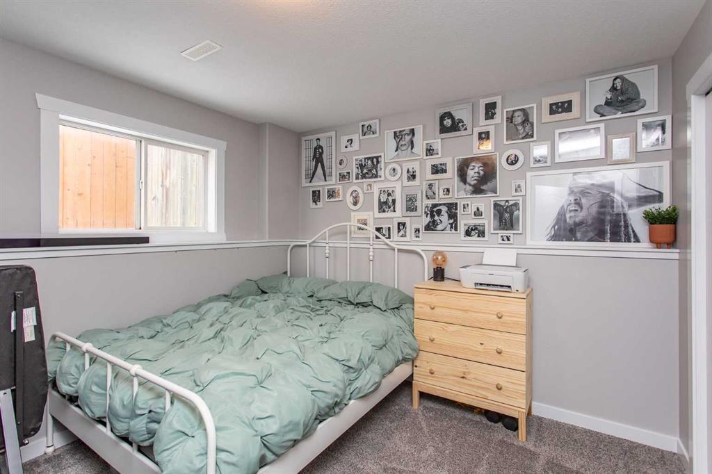 14 Silver Drive, Blackfalds, AB - Indoor Photo Showing Bedroom