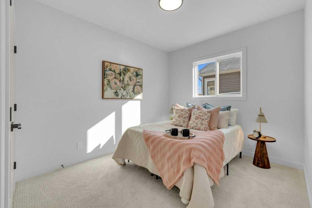 148 Red Ash Cove, Springbrook, AB - Indoor Photo Showing Bedroom