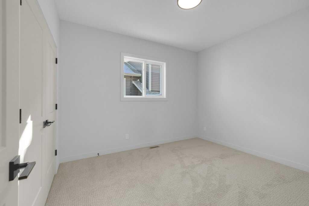 148 Red Ash Cove, Springbrook, AB - Indoor Photo Showing Other Room