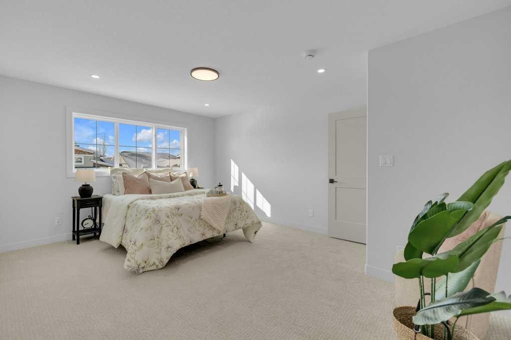 148 Red Ash Cove, Springbrook, AB - Indoor Photo Showing Bedroom