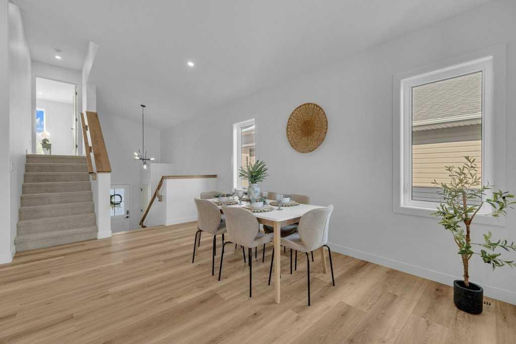 148 Red Ash Cove, Springbrook, AB - Indoor Photo Showing Dining Room