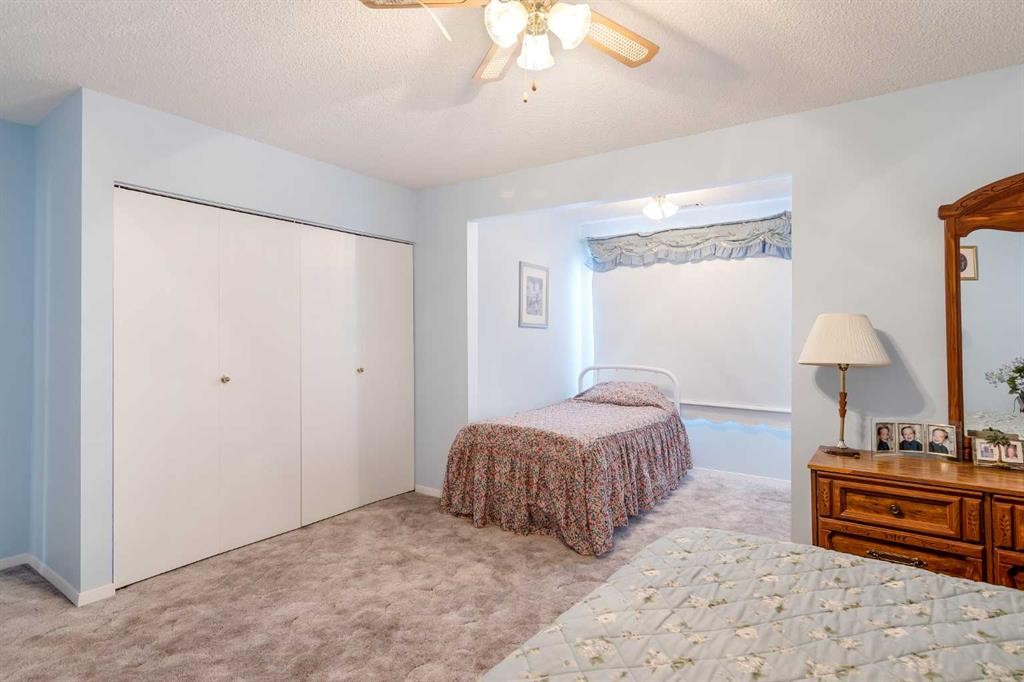 3 Rustic Road, Norglenwold, AB - Indoor Photo Showing Bedroom