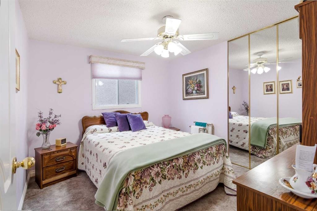 3 Rustic Road, Norglenwold, AB - Indoor Photo Showing Bedroom